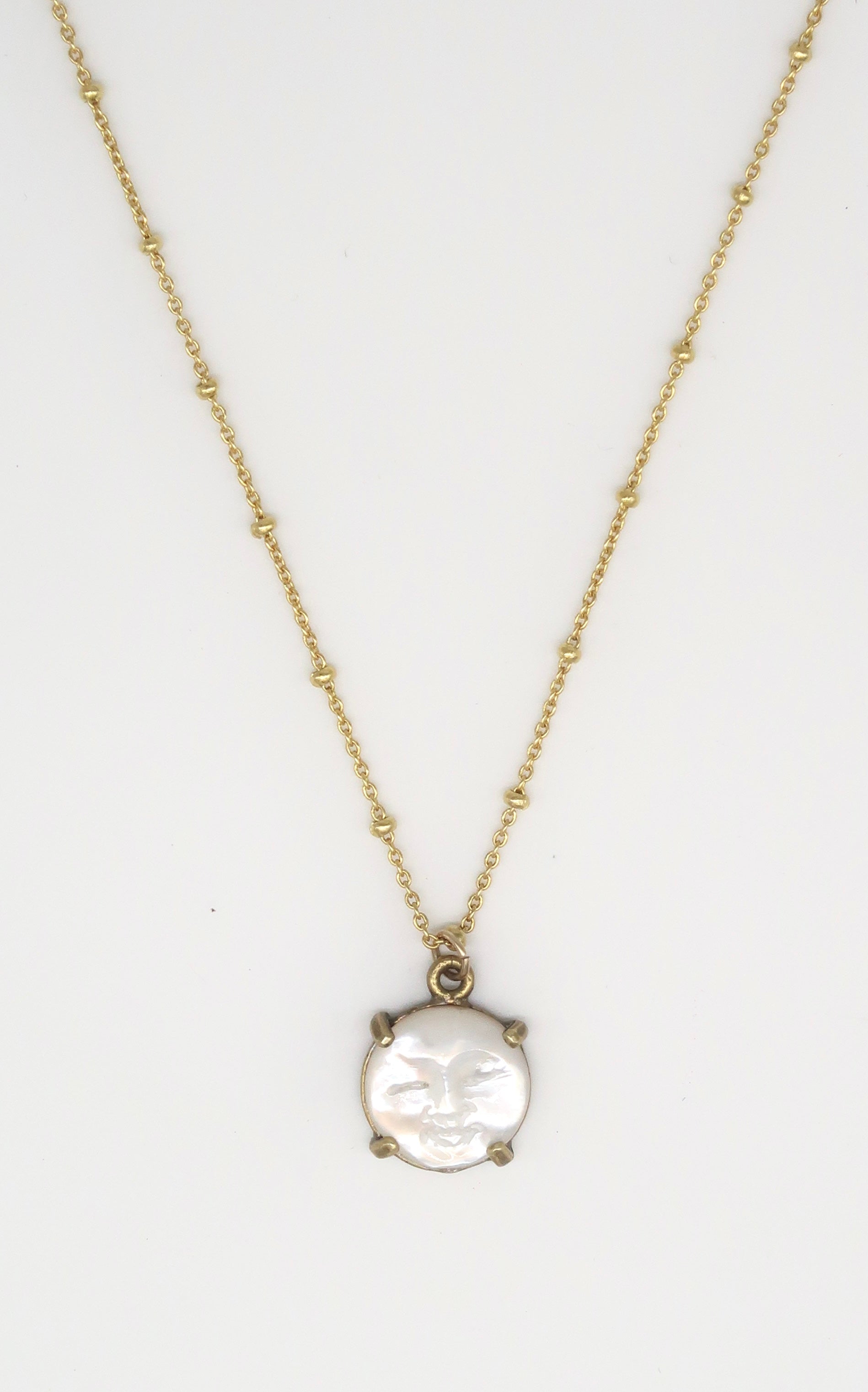 Tiny Hand-Carved Mother of Pearl Moon Face Necklace